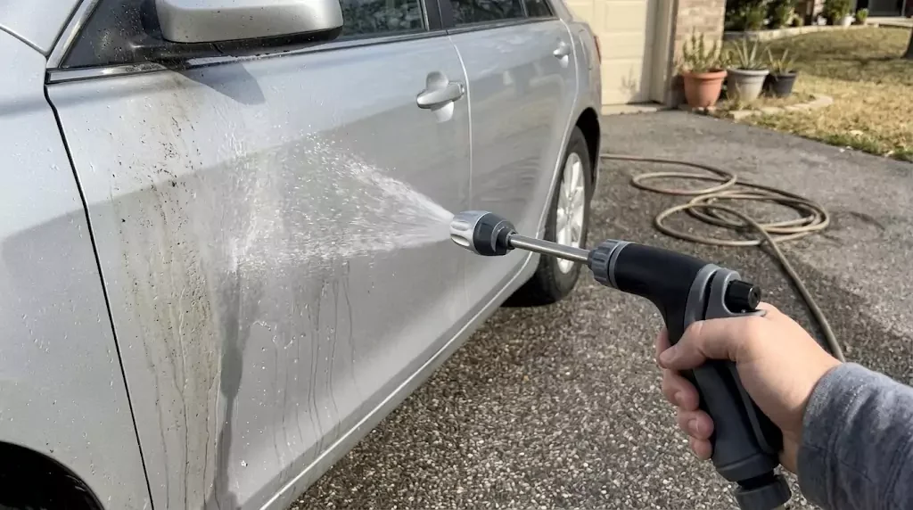 Jetterix test on a silver family estate — soft fan spray hitting the driver’s door directly